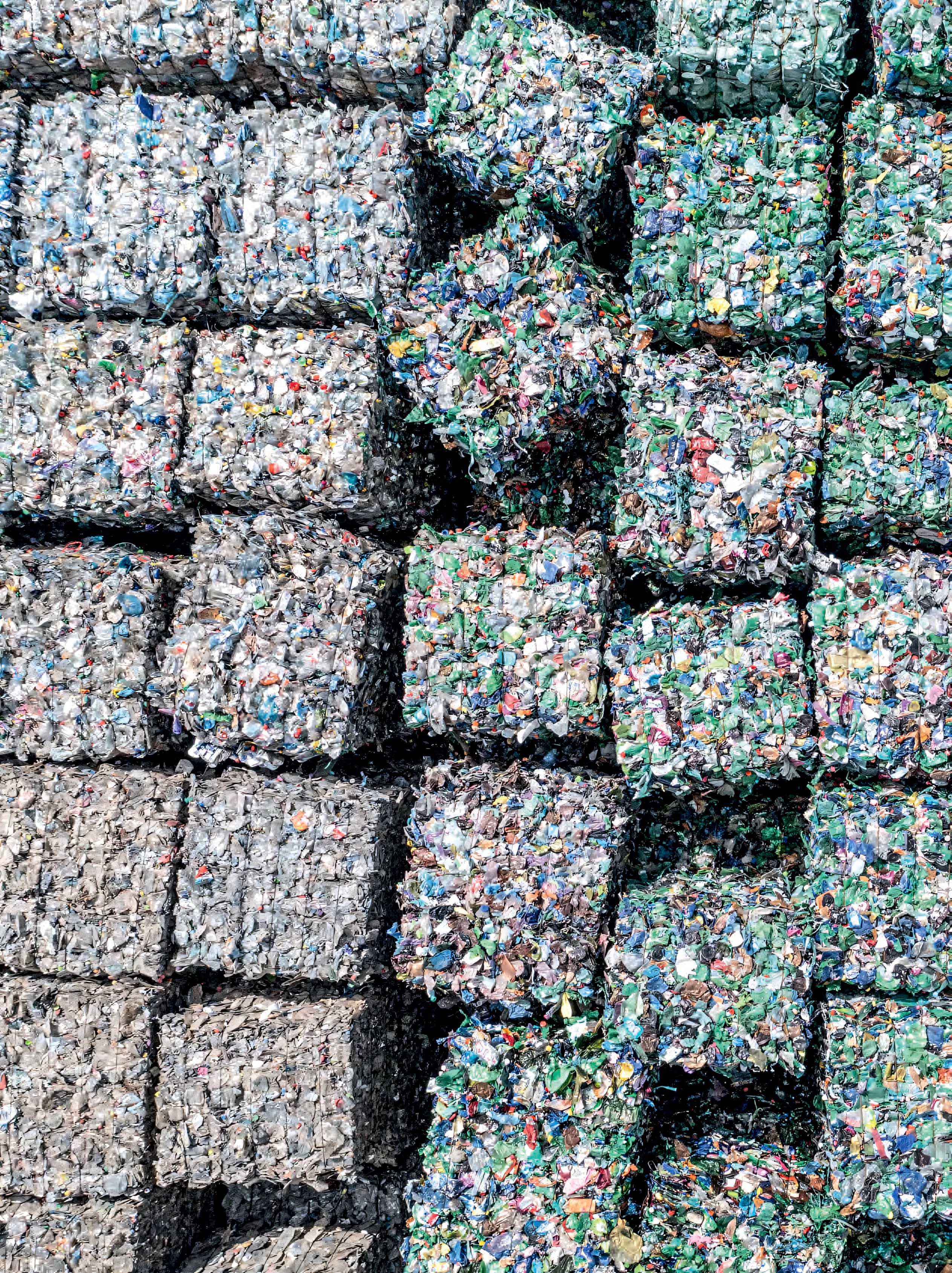 Industrial bales of recycled plastic used as feedstock for GRAF products
